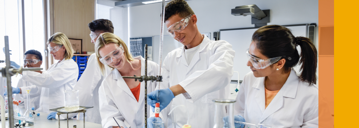 Young laboratory technicians working with scientific equipment